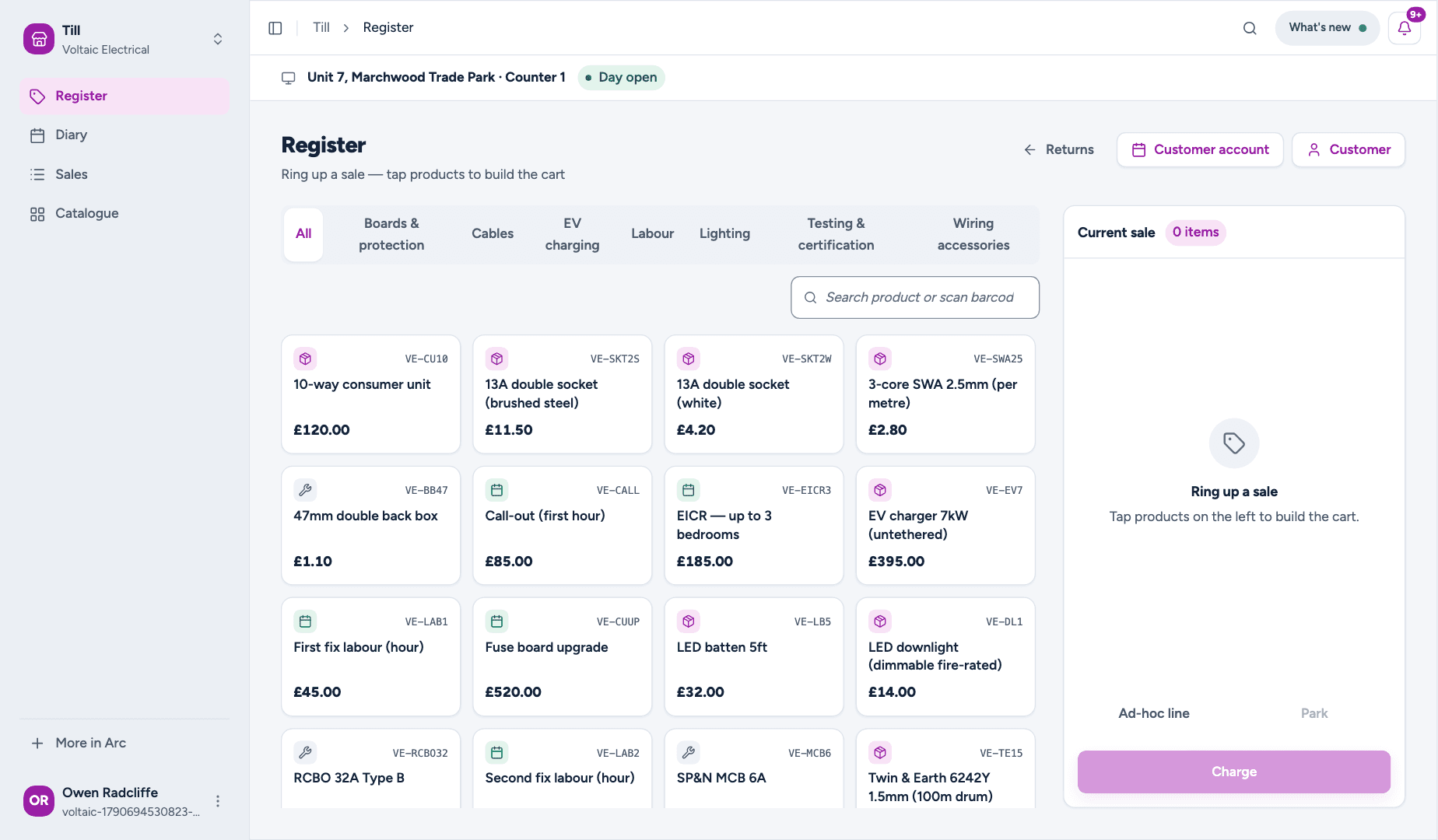 Till register with product tiles and a cart